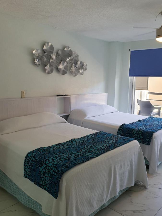 Appartement Marlin Turquesa Departamentos Frente Al Mar à Cancún Extérieur photo